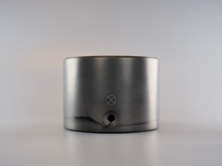 Nox One concrete base, graphite grey on grey background