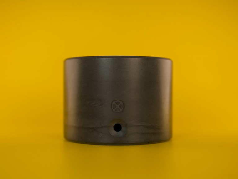 Nox One concrete base, graphite grey on yellow background