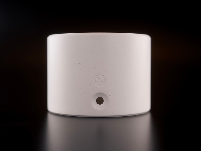 Nox One concrete base, white on dark background